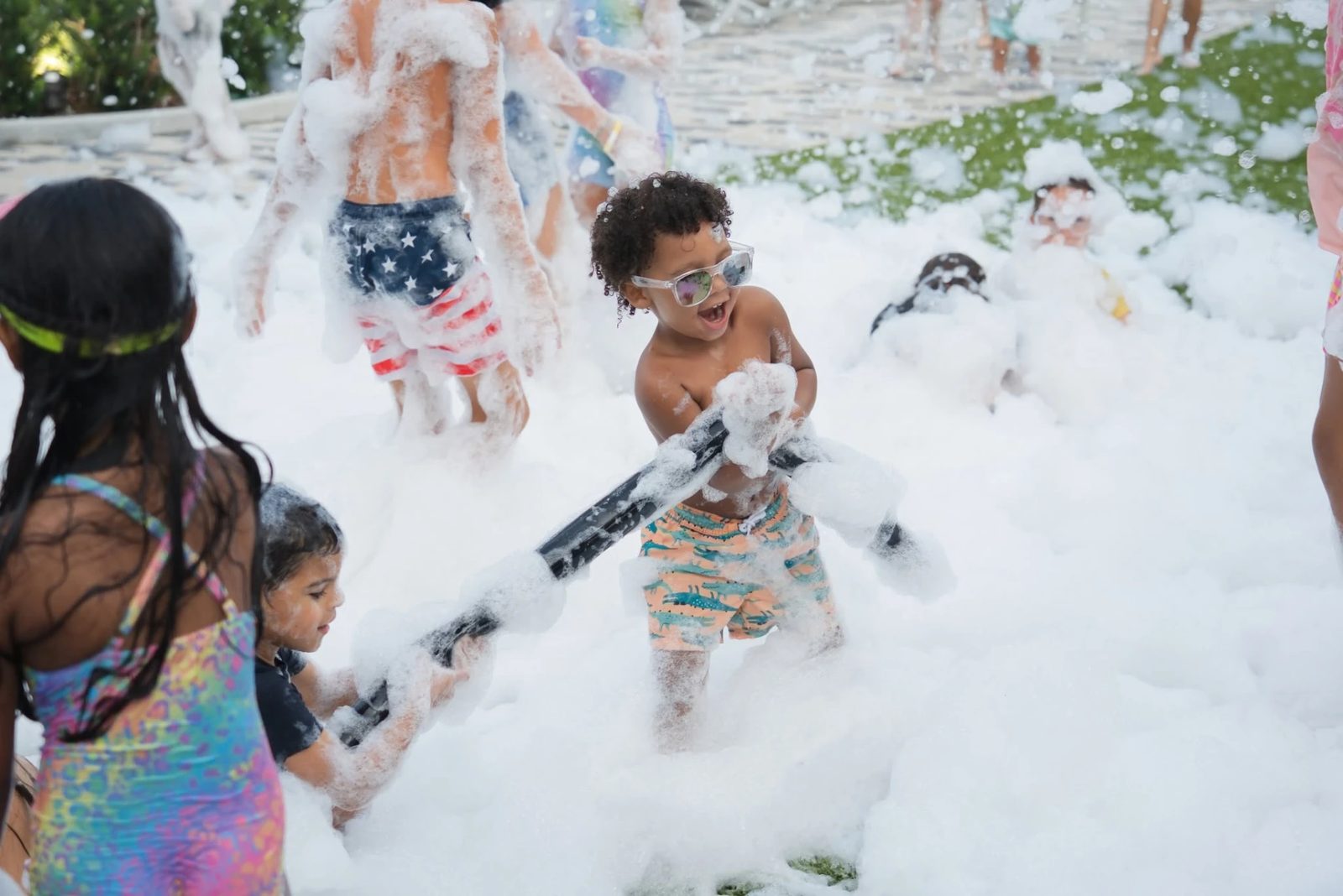 School field day foam party with a big crowd